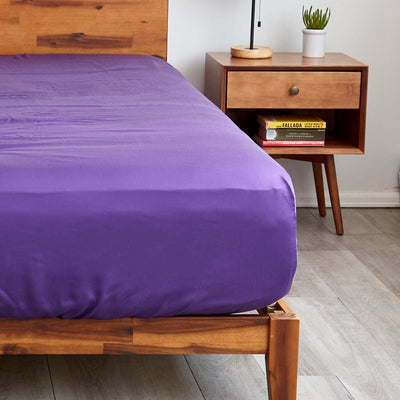 Sheets & Giggles royal purple fitted sheets with extra deep pockets that fit mattresses up to 20" thick for a super secure fit||Purple