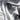 White draped fabric with soft folds and shadows, filling the entire frame. #color_white