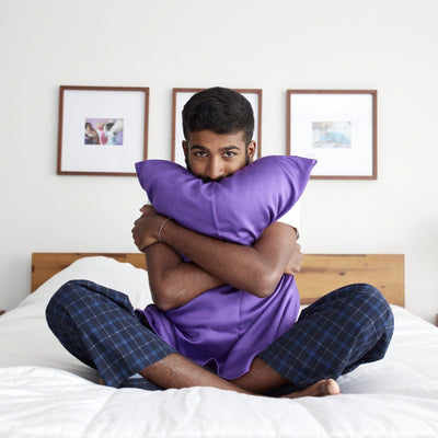 Girish is hugging our eucalyptus pillow in royal purple. #color_purple