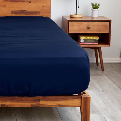 Sheets & Giggles navy blue fitted sheets with extra deep pockets that fit mattresses up to 20" thick for a super secure fit||Midnight