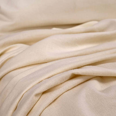 flannel sheets in ivory white made from organic cotton and eucalyptus lyocell. #color_ivory